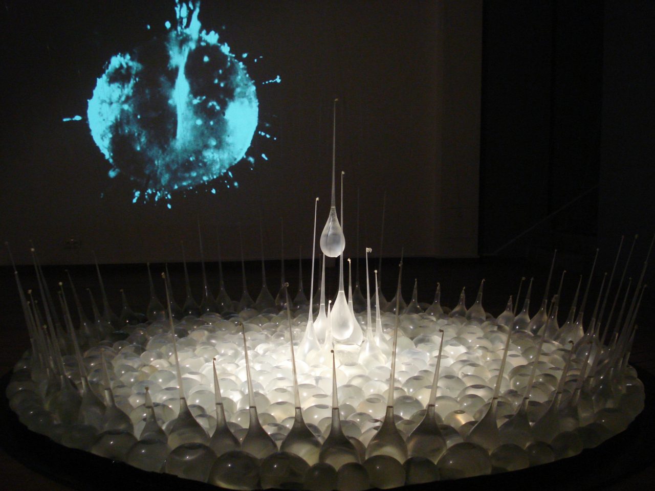 SPEED OF FALLING by Alexei Kostroma at Multimedia Art Museum in Moscow, 2008. Multimedia installation: latex, water, video, sound, photos